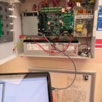 Commissioning an Advanced MxPro 5 fire alarm panel with a laptop