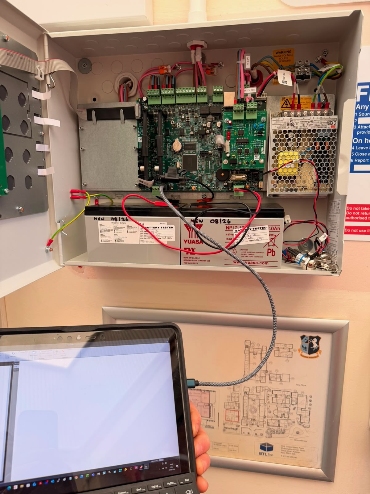 Commissioning an Advanced MxPro 5 fire alarm panel with a laptop